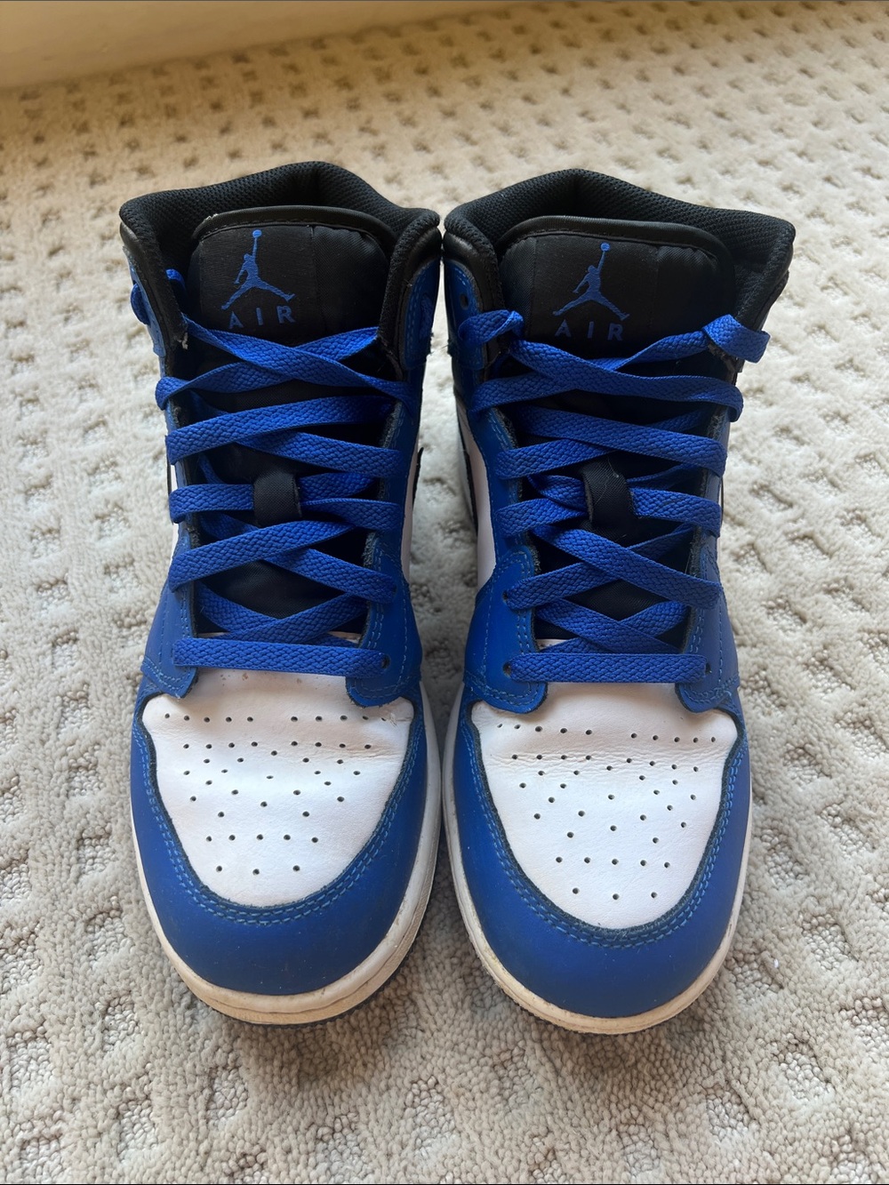 Jordan Kids Blue and White High-Top Sneakers only worn a few times.